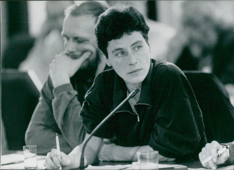 Ingrid Koppe, a member of New Forum, a pro-democracy party in East Berlin, speaks to a crowd following the collapse of the Berlin Wall. - Vintage Photograph