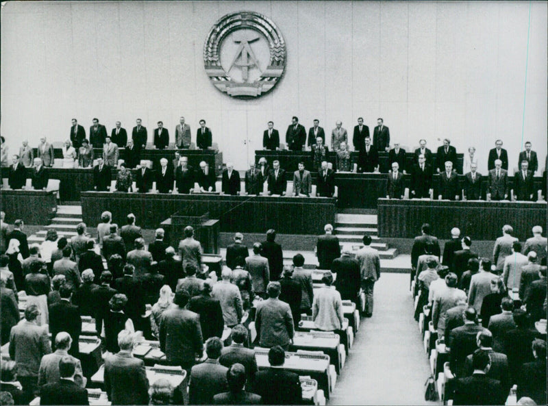 Members of the East German Parliament are seen inside the Palace of the Republic in East Berlin. - Vintage Photograph