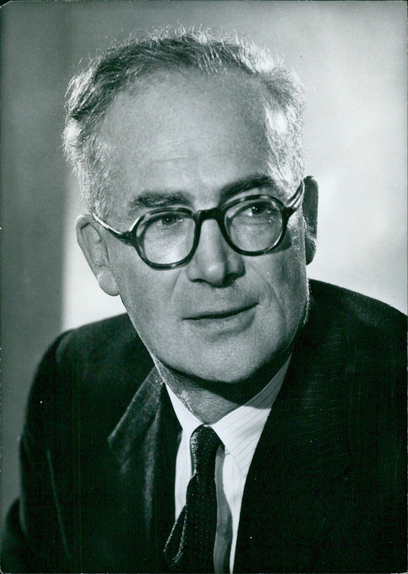 Sir Burke St. John Trend, KCB, CVO, Britain's Secretary of the Cabinet, poses for a portrait study in January 1963. - Vintage Photograph