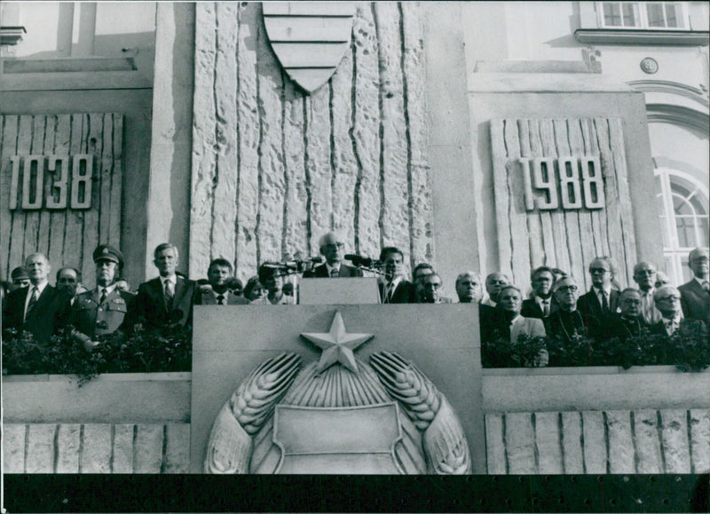 Hungarian officials and representatives of the Catholic Church celebrate 950 years since the death of King Stephen, the founder of the Hungarian state, at a ceremonial mass rally in Budapest. - Vintage Photograph