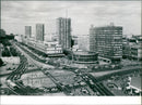 The modern city centre of Warsaw, Poland is seen from Marezalkowska Street and Jerozolimskie Avenue. The area houses commercial offices and apartment blocks. - Vintage Photograph