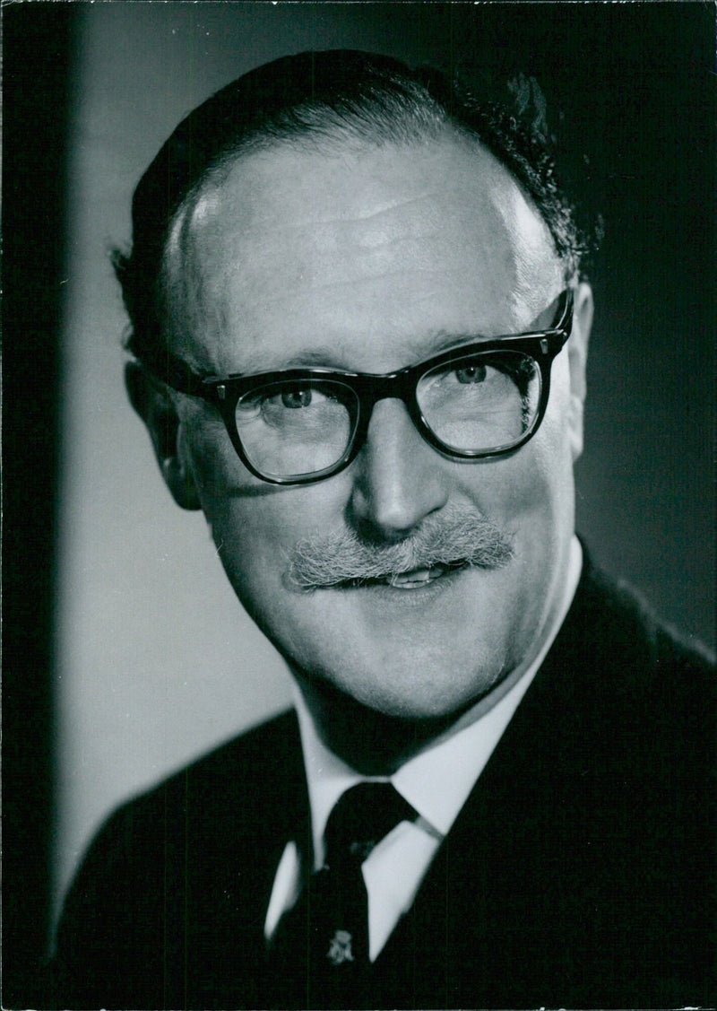 Sir Diarmaid Conroy, President of Industrial Tribunals for England and Wales, is pictured in 1966. - Vintage Photograph