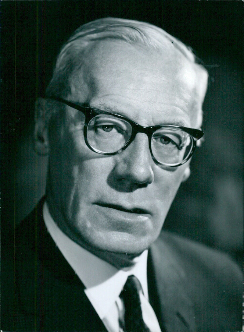 Sir William Dale, Legal Adviser to the Commonwealth Relations Office since 1961, poses for a portrait study in London. - Vintage Photograph