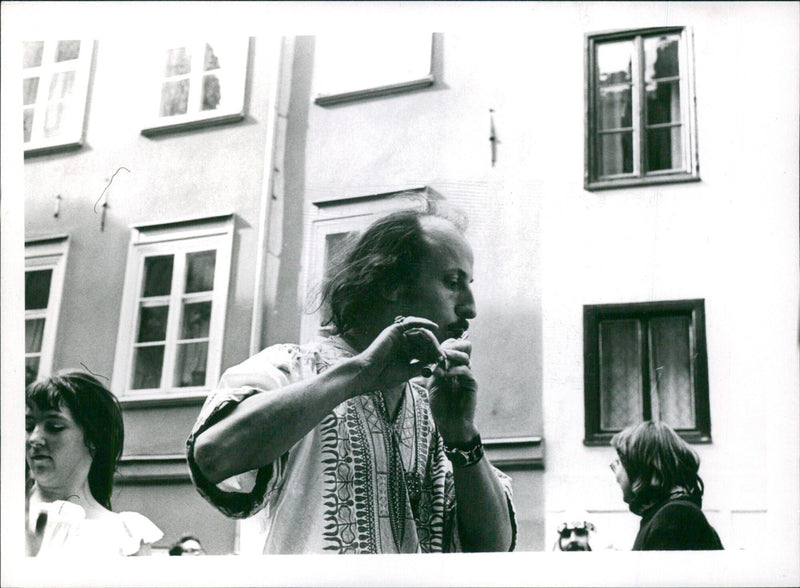 Revelers take to the streets of Gamla stan for the annual Karneval celebration in September 1970. - Vintage Photograph