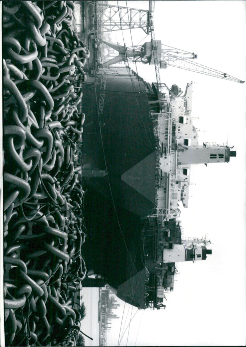 Two massive supertankers, named the Tanker Twins, await repairs at the Mitsui Shipbuilding and Engineering yard in Chiba, Japan. - Vintage Photograph