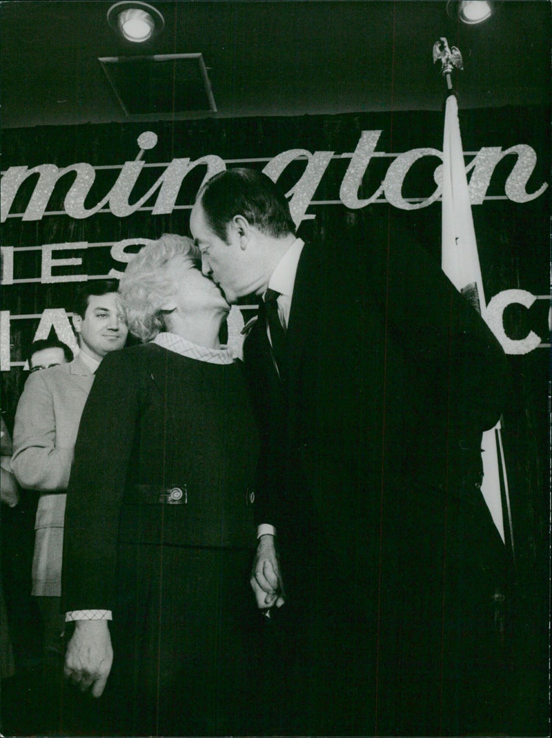 A group of students celebrates their graduation from IES AAG 6101 We with a joyful embrace. - Vintage Photograph