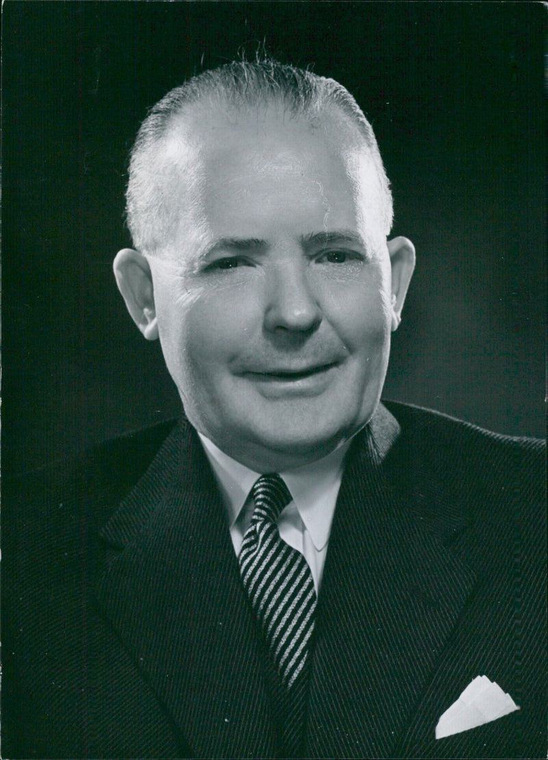 British businessman John C. George, Conservative candidate for the Pollok Division of Glasgow, is photographed in 1955. - Vintage Photograph