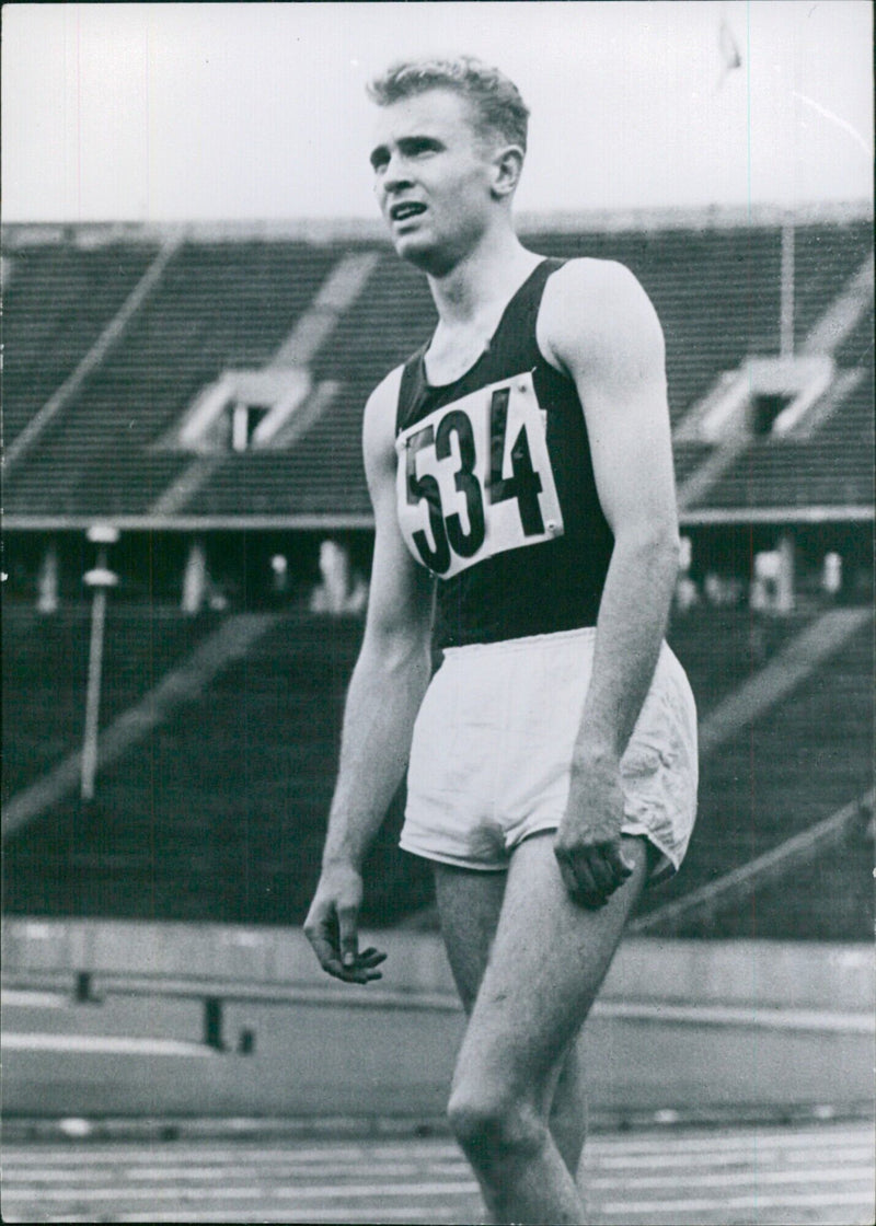 Manfred Germar of West Germany poses as an Olympic candidate for the 100 metres and 4 x 100 metres relay. - Vintage Photograph