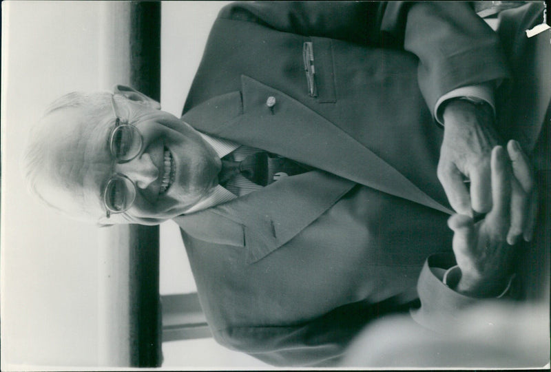 A crowd of people gather outside the Palazzo Cavour in Milan, Italy, to celebrate the 53rd anniversary of the International Day of Peace. - Vintage Photograph