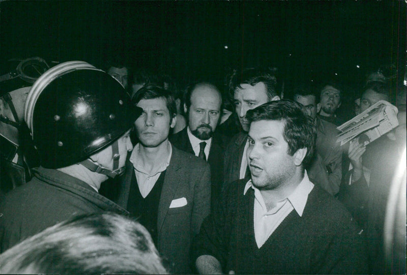 French journalist Alain Glismak takes a photo of the busy Avenue Frochot in Paris on June 4, 2021. - Vintage Photograph