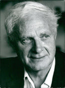 Stephen Spender, British poet, critic, and thinker, is photographed at home in London in 1971. - Vintage Photograph