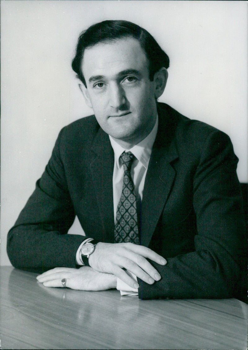 H. SALMON, the managing director of J. Lyons & Co. Ltd, is seen in a portrait taken by the Camera Press London on October 6, 1973. - Vintage Photograph