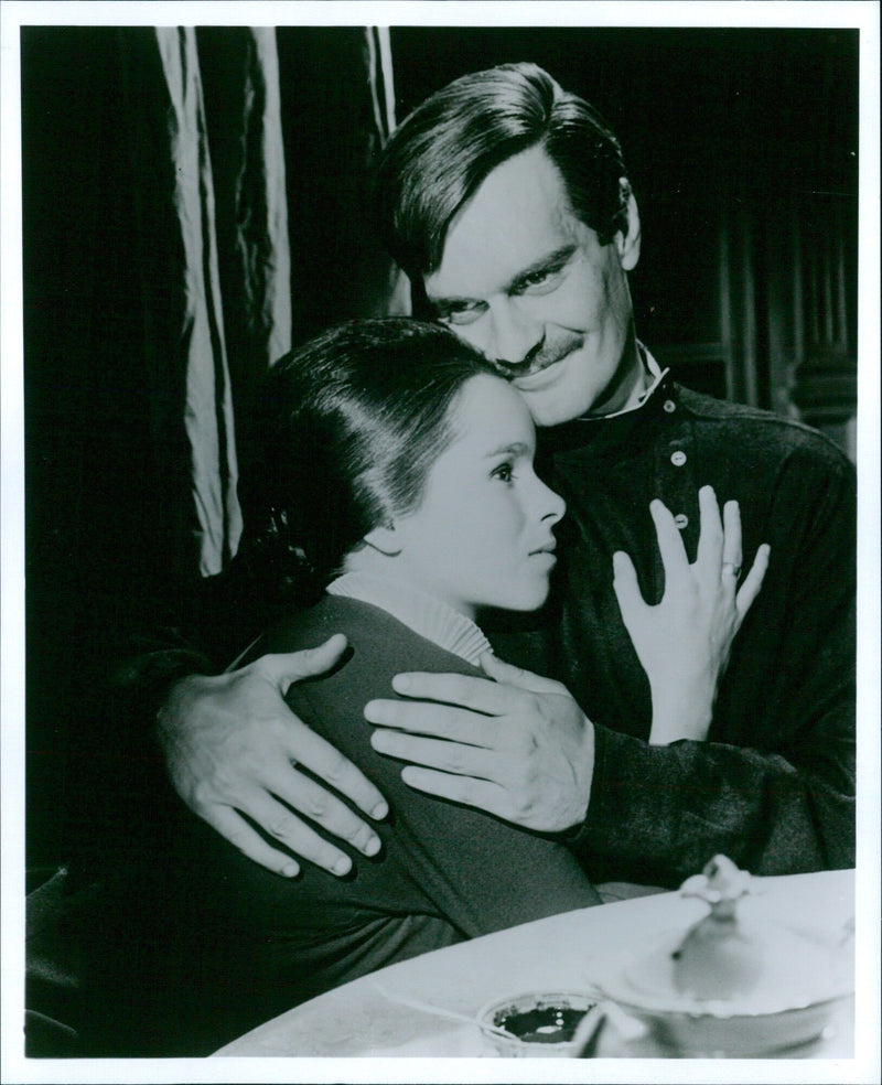 Actors Omar Sharif and Geraldine Chaplin recreate a scene from the iconic 1965 film "Doctor Zhivago" during a photo shoot in Rome, Italy on April 24th, 2021. - Vintage Photograph