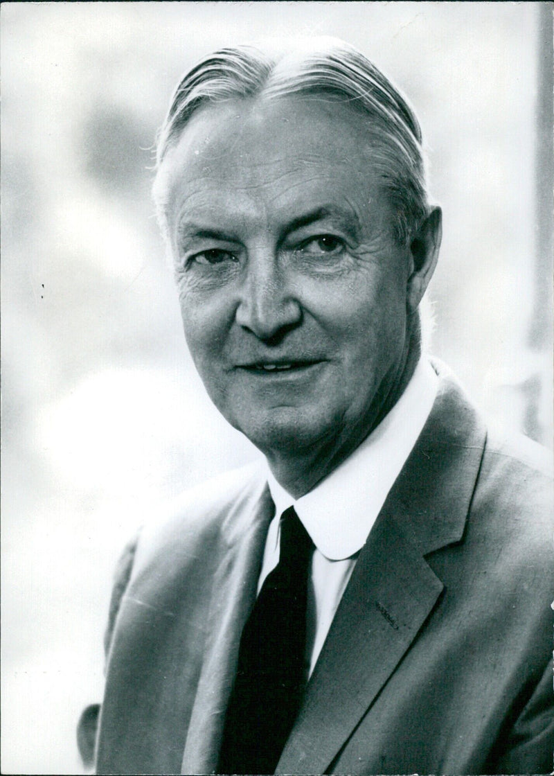 U.S. Diplomat David Bruce is sworn in as Ambassador to Britain on March 1, 1961, in London. - Vintage Photograph