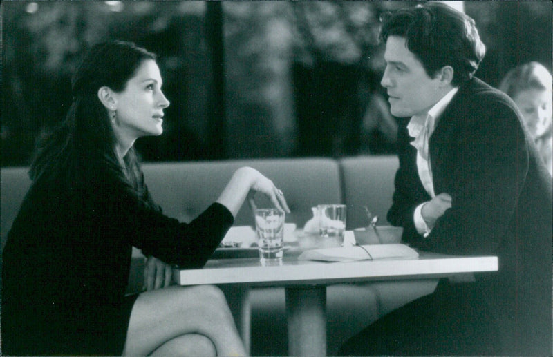 Actors Julia Roberts and Hugh Grant attend a screening of "Notting Hill" in London on March 29, 2021. - Vintage Photograph