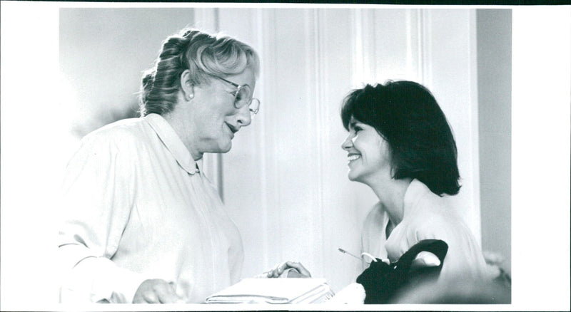 Actors Robin Williams and Sally Field reunite on the set of the 1993 comedy-drama "Mrs. Doubtfire." - Vintage Photograph