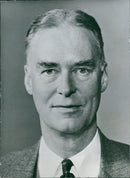 Acting Secretary of State Christian A. Herter takes on the role of Secretary of State in the absence of Mr. Dulles at a hospital in Stockholm, Sweden on April 8, 1959. - Vintage Photograph