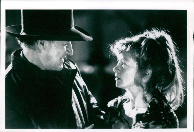 Gene Hackman and Frances Fisher star in the movie "The Unforgiven" (1992). - Vintage Photograph