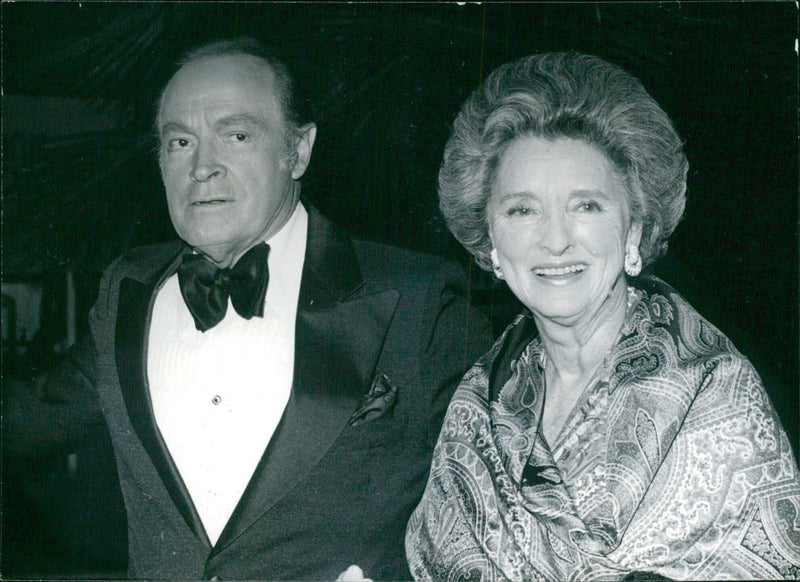 Hollywood power couple Bob and Dolores Hope attend a Hollywood event in 1987. - Vintage Photograph