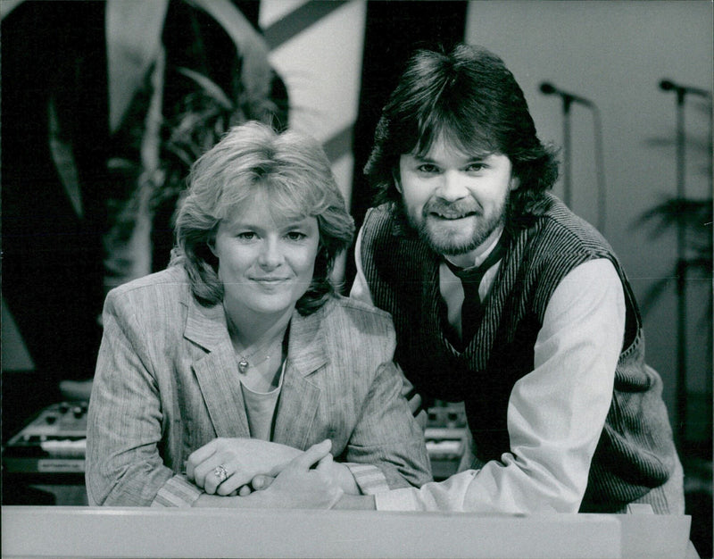 Elisabeth Andreasson and Anders Glennmark perform during a TV show, Tratten, which premiered on January 8, 1984. - Vintage Photograph