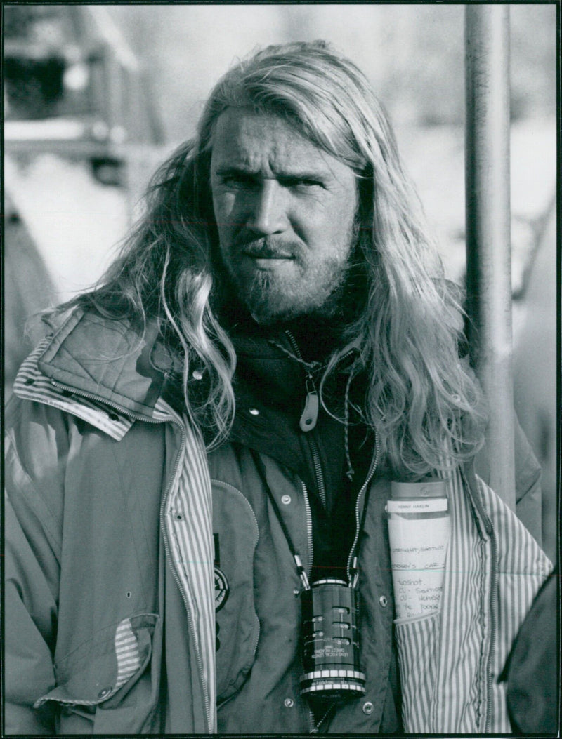 Director Renny Harlin celebrates the completion of his latest film with a night out in Finland, surrounded by friends. - Vintage Photograph