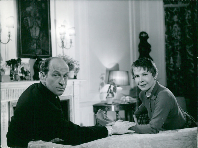 Hollywood couple Garson Kanin and Ruth Gordon pose for a study by photographer David Sim. - Vintage Photograph