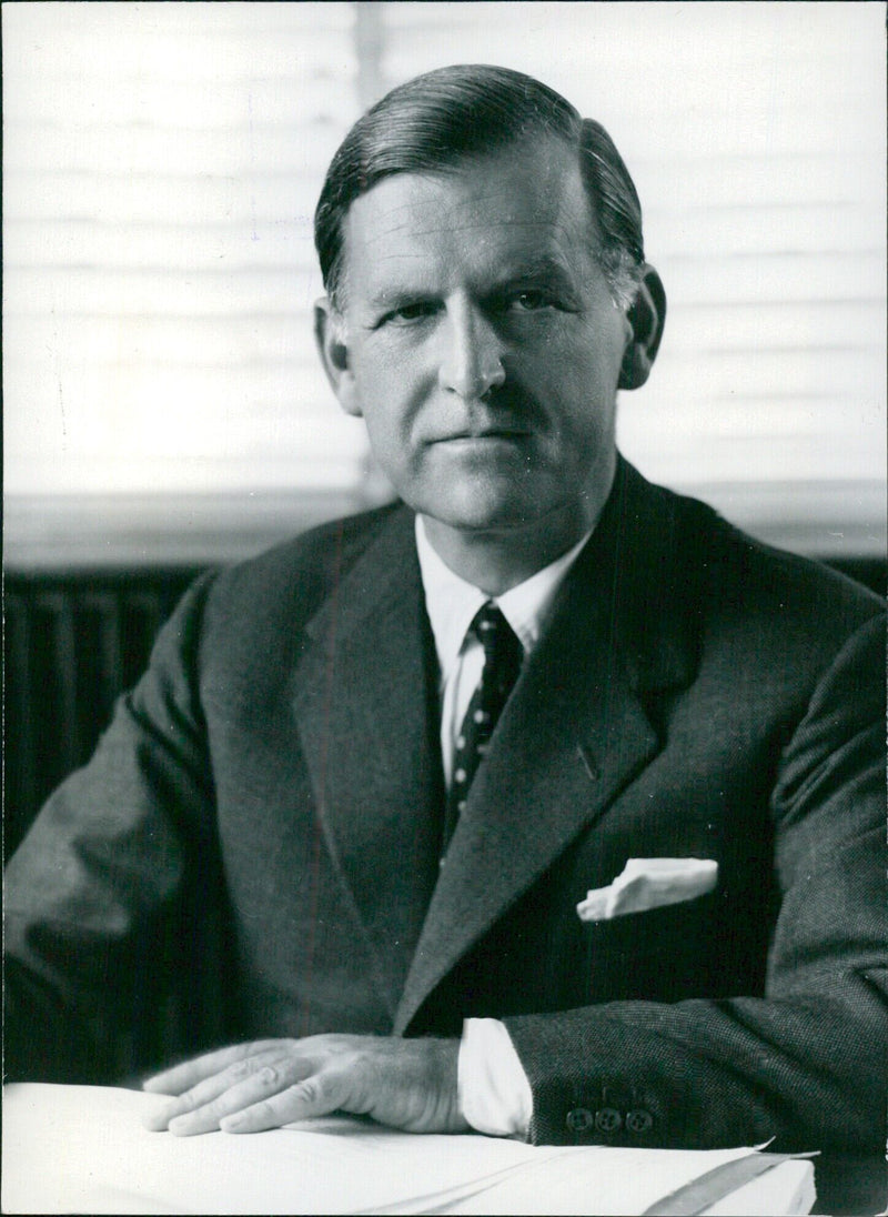 Duncan Morris Oppenheim, Chairman of the British-American Tobacco Co. Ltd., smiles for the camera in Stockholm, Sweden on May 17, 1960. - Vintage Photograph