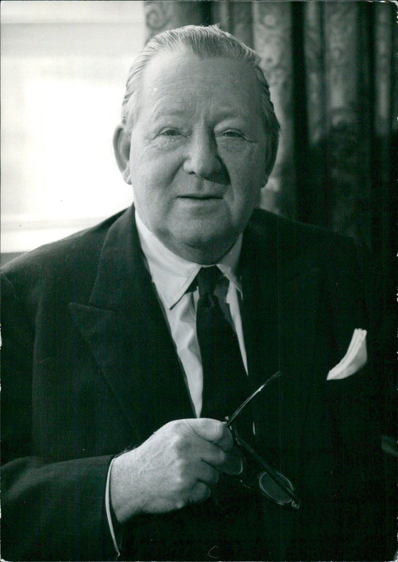 British businessmen Lord Renwick and Robert Burnham Renwick pose together in London, England. - Vintage Photograph