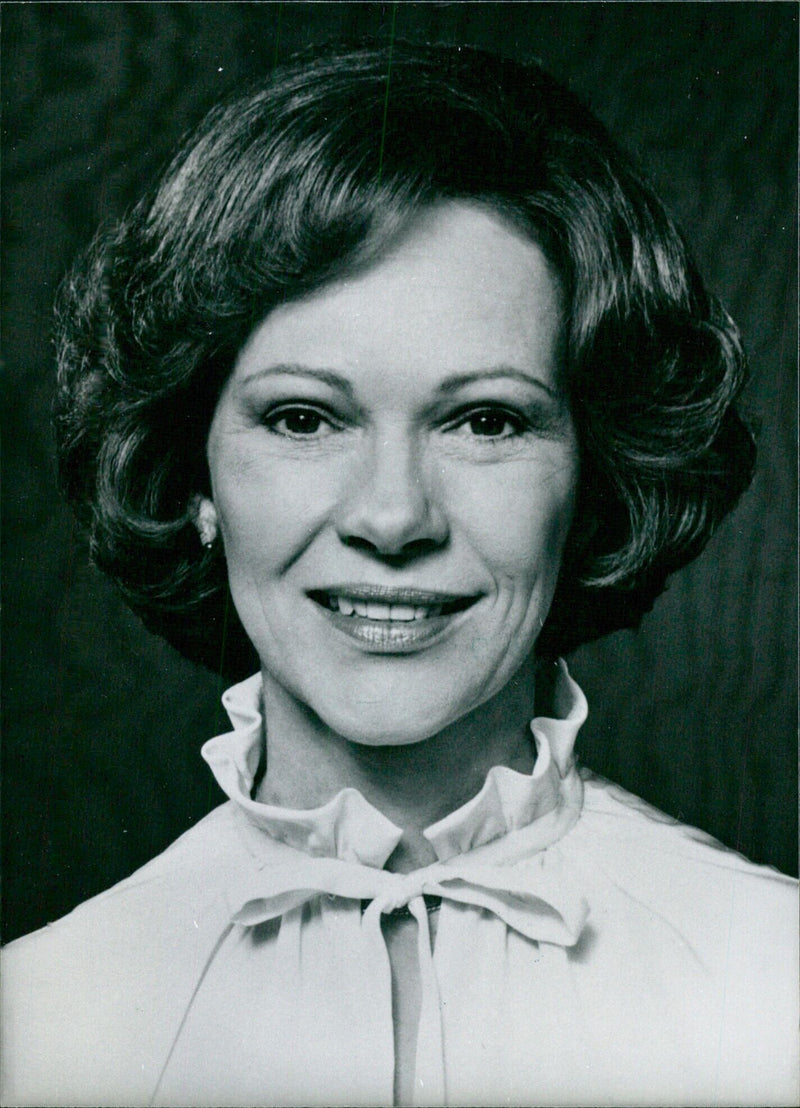 Mrs. Rosalynn Carter, First Lady of the United States, smiles brightly while posing for a photograph in 1978. - Vintage Photograph