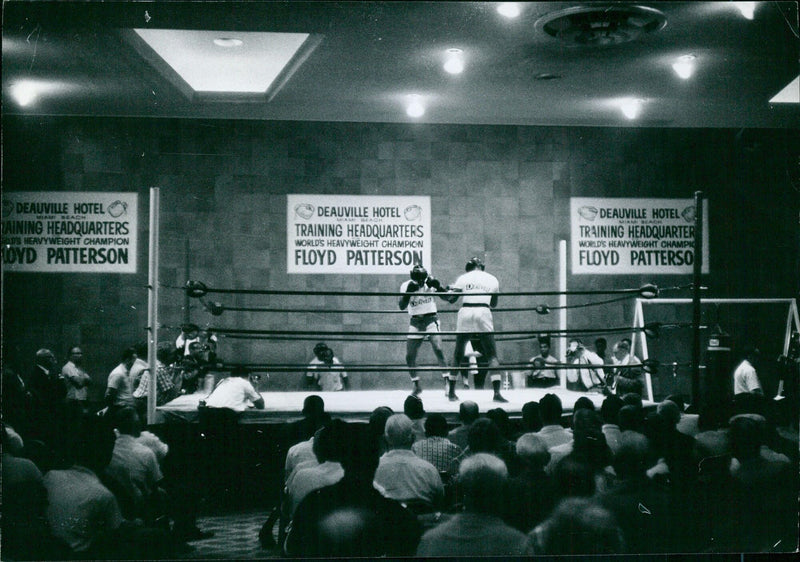 Heavyweight champion Floyd Patterson trains at the Deauville Hotel Miami Beach. Photographer: Bill Hamilton, Camera Press. - Vintage Photograph