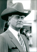 Larry Hagman portrays the iconic character J.R. Ewing in the hit soap drama "Dallas". - Vintage Photograph