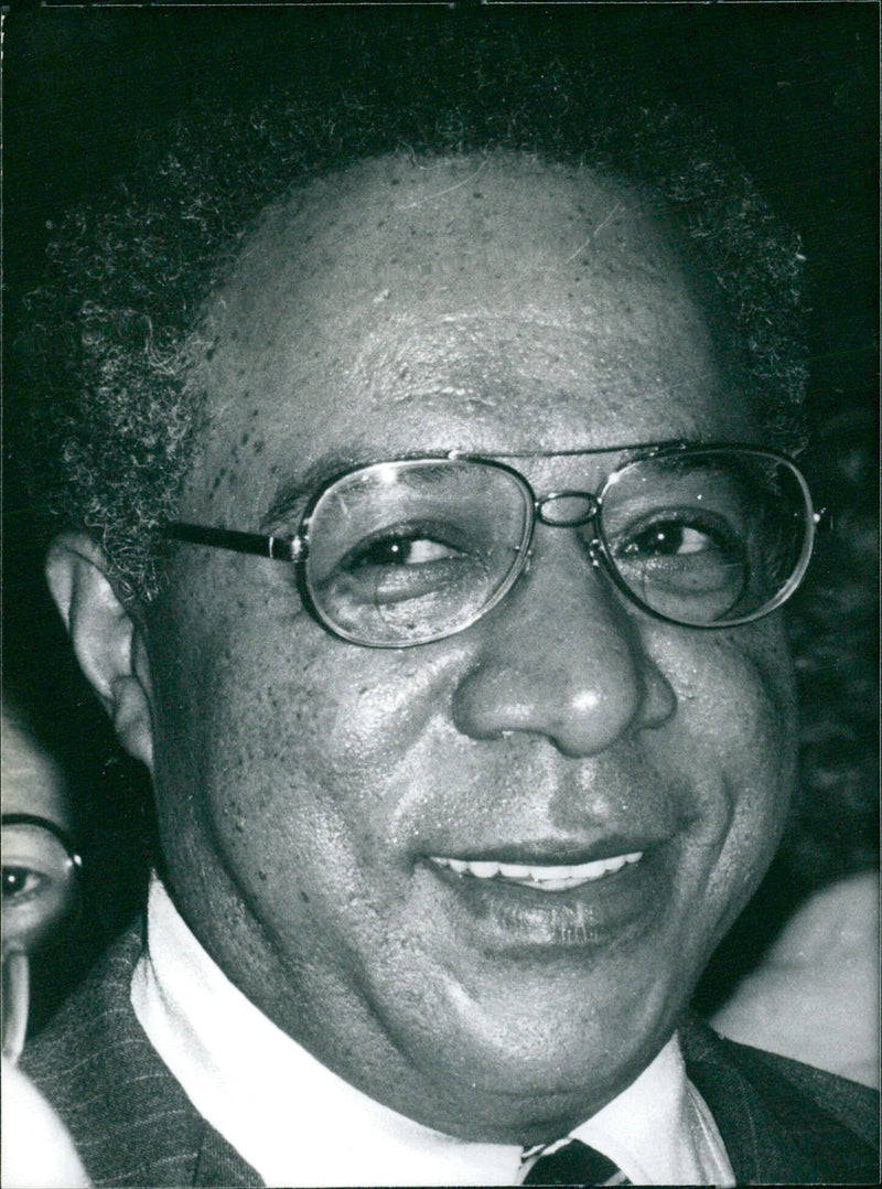 Alex Haley, author of the best-selling novel "Roots" and its subsequent television series, poses for a photograph in 1979. - Vintage Photograph