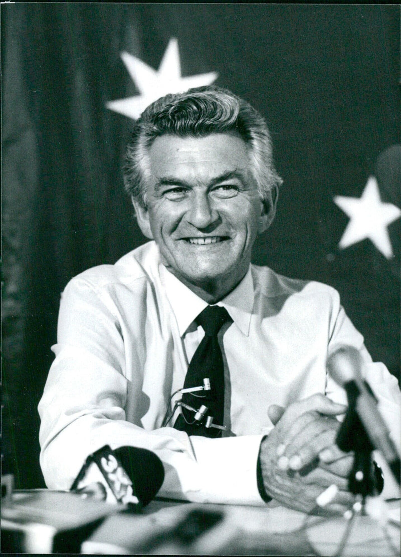 Australian Prime Minister Bob Hawke celebrates his election victory in 1983 with a wide smile. - Vintage Photograph