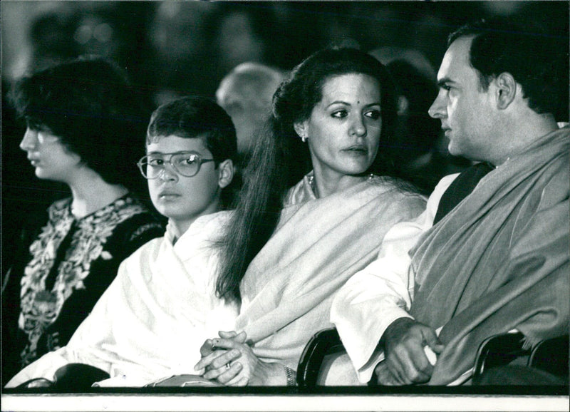 Indian Prime Minister Rajiv Gandhi poses with his wife Sonia, son Rahul and daughter Priyanka after his swearing-in ceremony at Rastrapati Bhawan on December 31, 1984. - Vintage Photograph