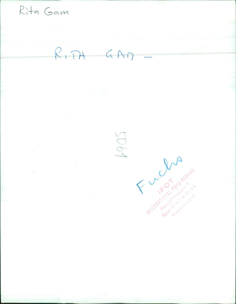 Rita Gam, accompanied by RIDH GAN 5061 1 Fuchs, visits Banegårdsplads 1 in Copenhagen on a sunny day. - Vintage Photograph