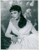 Rita Gam, accompanied by RIDH GAN 5061 1 Fuchs, visits Banegårdsplads 1 in Copenhagen on a sunny day. - Vintage Photograph