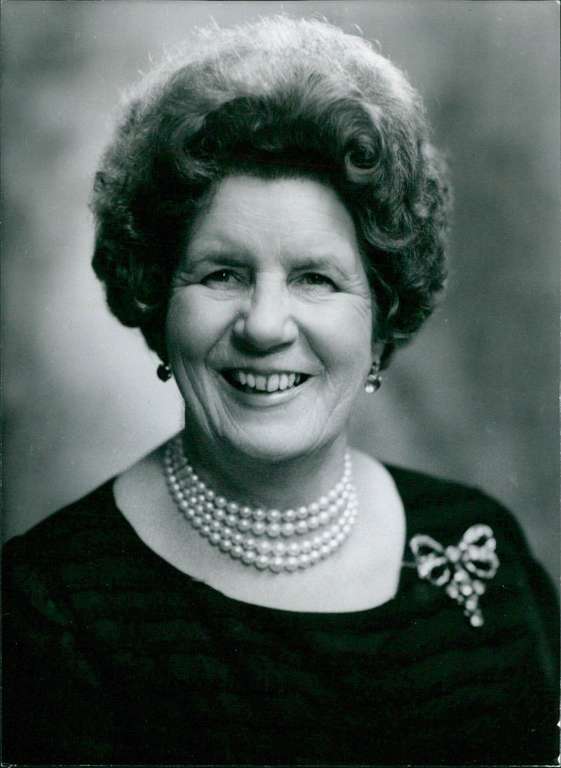 British broadcaster Mrs. Helen Glover poses for a portrait taken by Bassano Camera Press in London. - Vintage Photograph