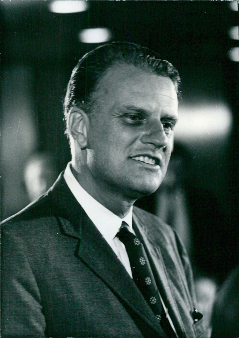 Evangelist Billy Graham is seen during his four-week visit to Great Britain in June 1966. - Vintage Photograph