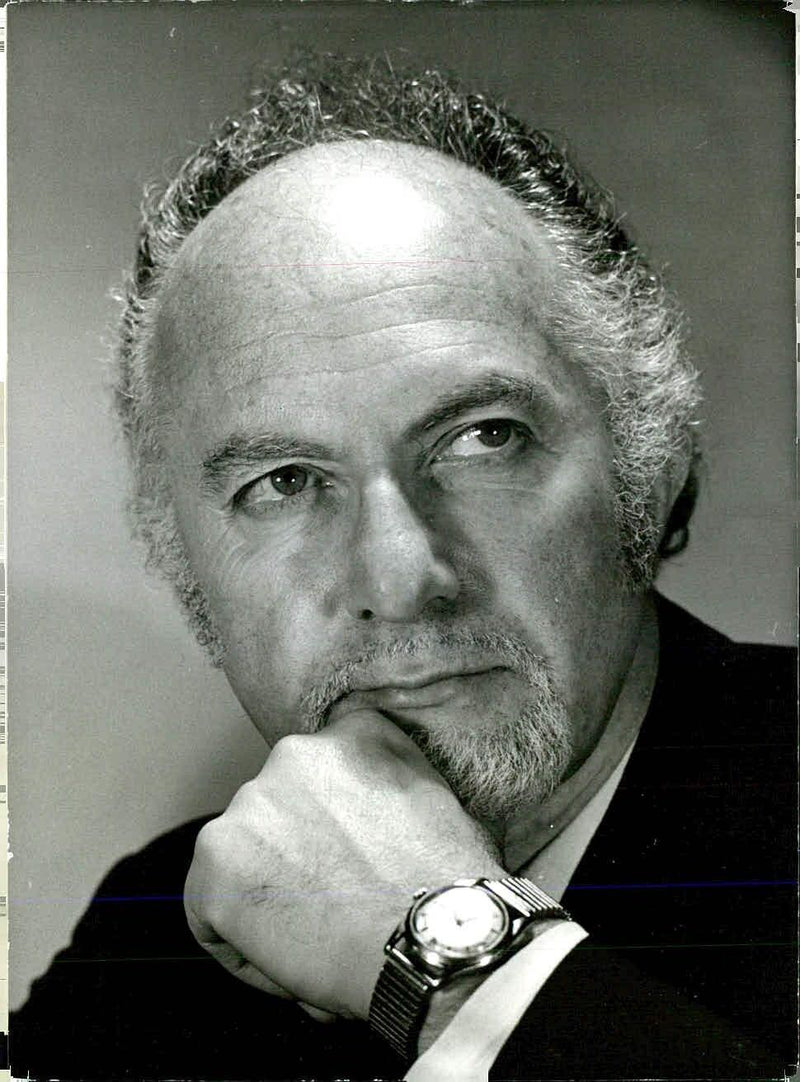 Dr. Michael Bialoguski, a G.P. from Epsom in Surrey, leads the New Philharmonia Orchestra at the Royal Albert Hall in London. - Vintage Photograph