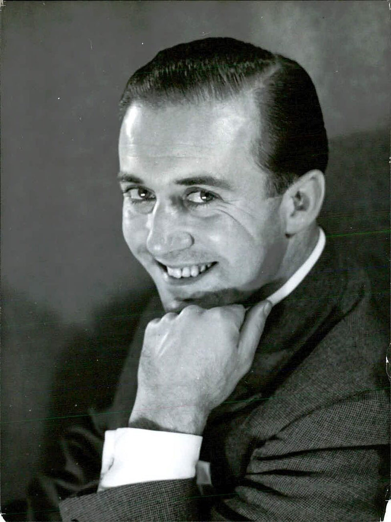 British broadcaster and televiser Peter West poses for a portrait in London. - Vintage Photograph