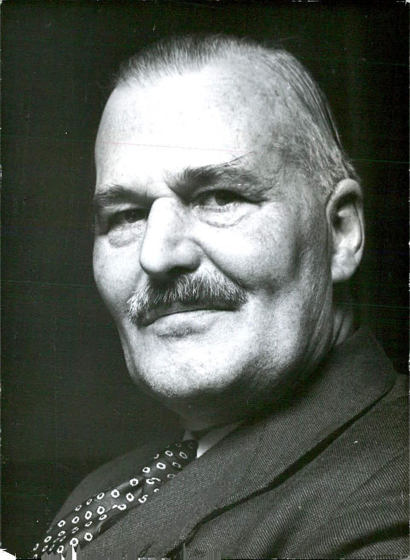 Sir Reginald Franklin, KBE CB, Deputy Secretary of the Ministry of Agriculture and Fisheries, poses for a portrait study taken by Tom Blau. - Vintage Photograph