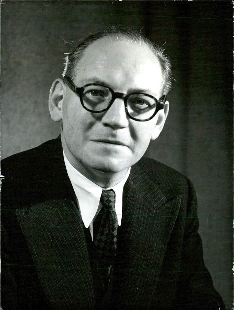 British Labour Member of Parliament Eric G.M. Fletcher poses for a portrait in London. - Vintage Photograph