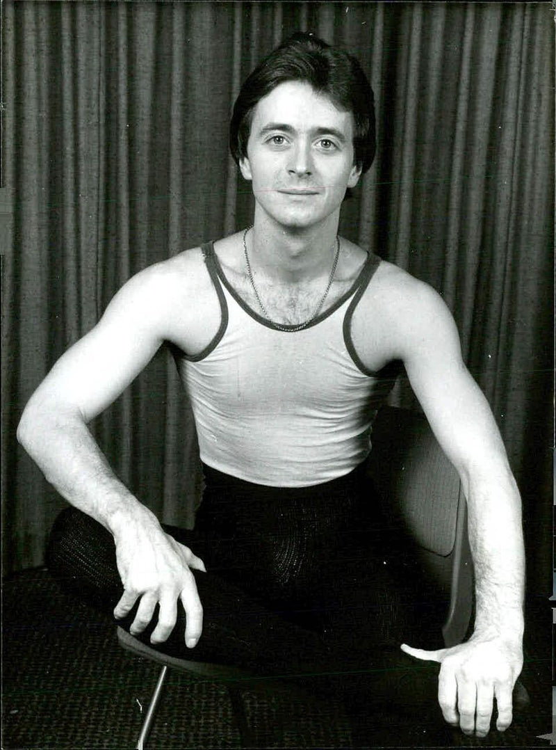 London Festival Ballet star Nicholas Johnson performs during the Royal Gala premiere of Ronald Hynd's ballet "Rosalinda" at the Royal Opera House in March 1979. - Vintage Photograph