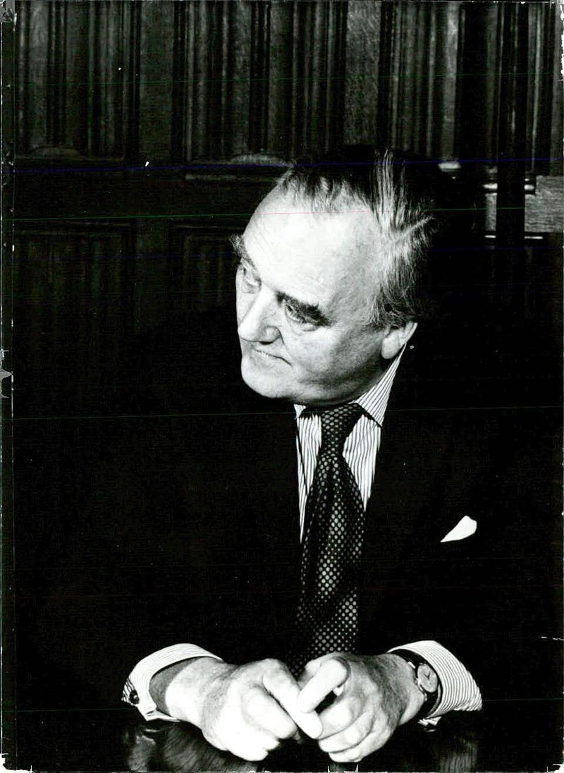 William Whitelaw, Deputy Leader of the British Conservative Party, speaks at a Shadow Cabinet meeting in London. - Vintage Photograph