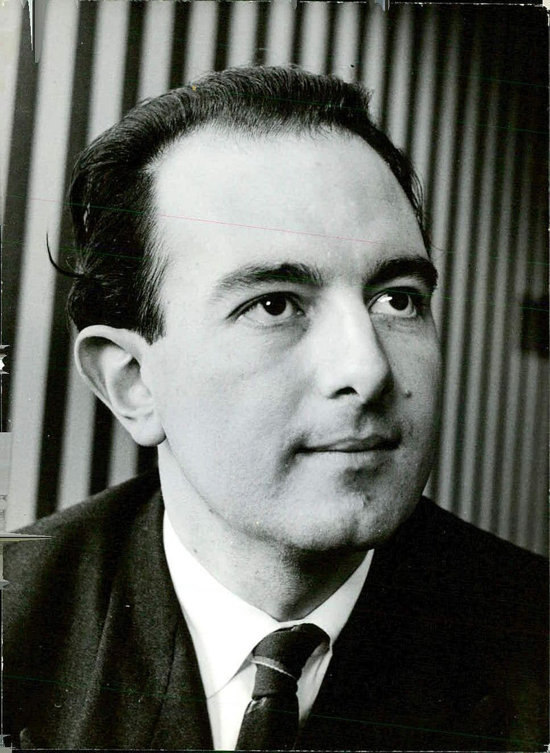 John Barker, the choir master of Sadler's Wells Theatre in London, poses for a portrait on Syday, 2021-05-03. - Vintage Photograph