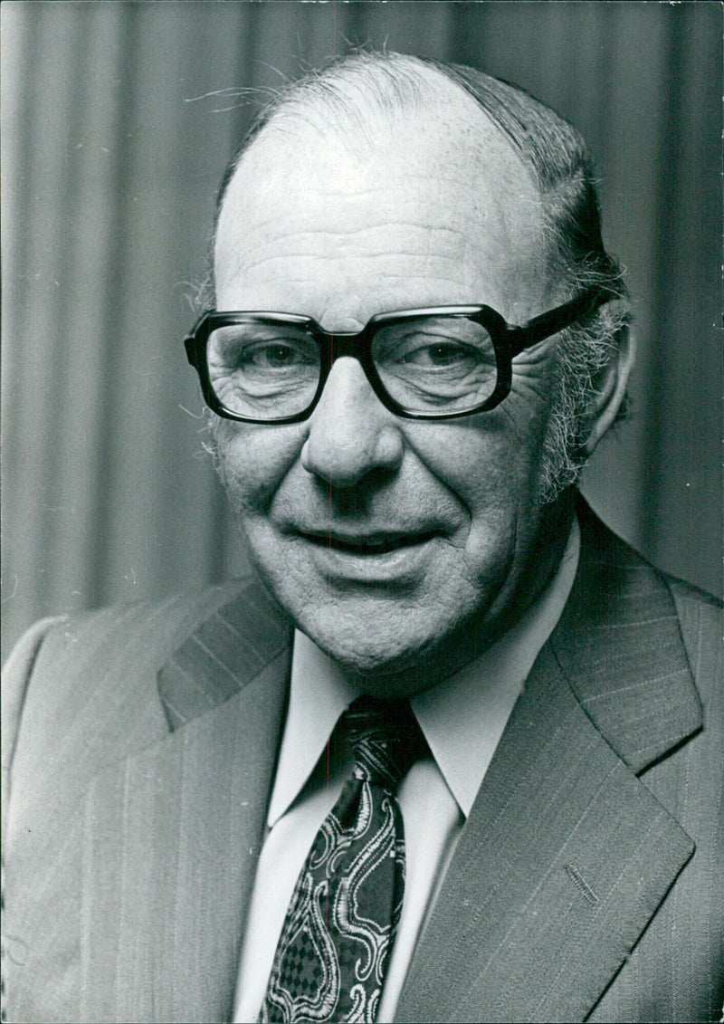 British businessman Leonard Recan, chairman of Carrington Viyalla Ltd., poses for a photo at Camera Press Ltd. in London, 1977. - Vintage Photograph