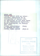 Indian artist Mukul Dey poses with his artwork ahead of the opening of his exhibition at the Commonwealth Institute in South Kensington on January 8th, 1960. - Vintage Photograph