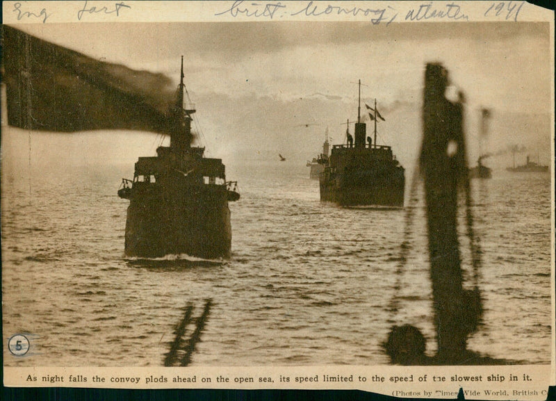 A convoy of British ships traverses the Atlantic Ocean at night in 1941. (Photo by Times Wide World/British C Partyg bonory E 31) - Vintage Photograph