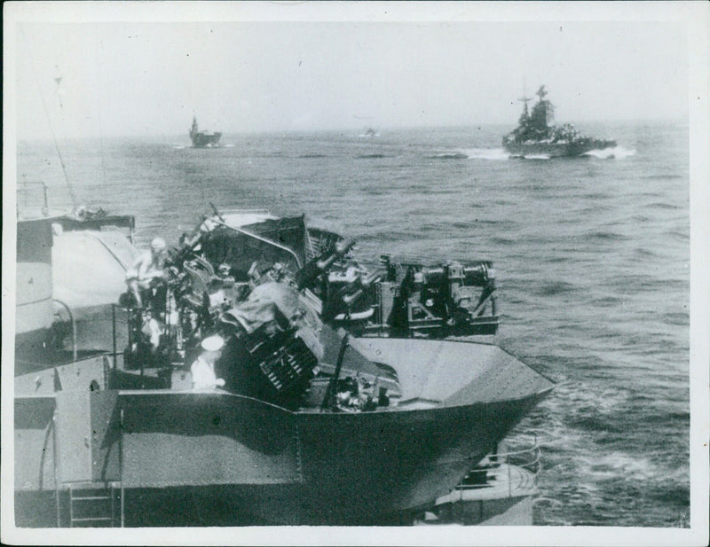 British navy defending a convoy from a two-day attack by aircraft, E-boats, and submarines in the Mediterranean during World War II. - Vintage Photograph