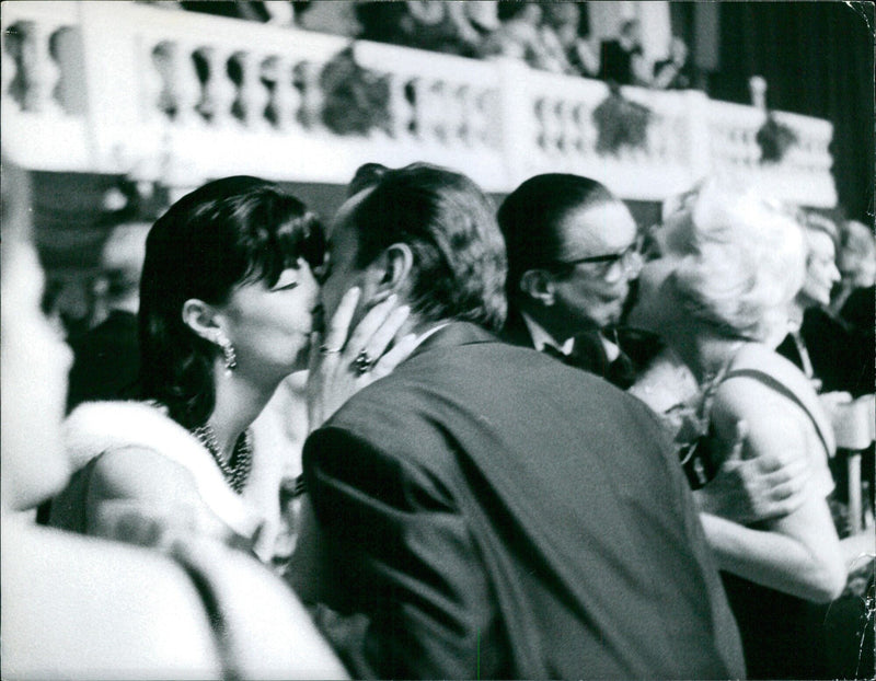 Swedish Prime Minister Tage Erlander and other members of his cabinet are seen enjoying a buffet meal at Sveavagen restaurant in Stockholm on January 4, 1961. - Vintage Photograph